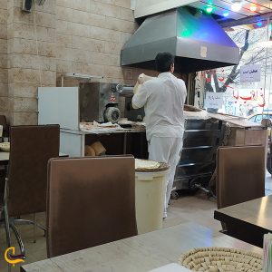 Hot and fresh bread baking oven in Kababi Hot bread Kebab hot nights in Tehran